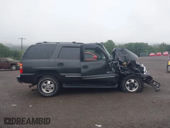 ✅ 2003 Chevrolet Tahoe LS • VIN: 1GNEC13V83R199980 • Lot: 42524928. Listed on IAAI with 152,769 mi. Free auction sales archive from the USA and detailed vehicle history report at DreamBid. Image 13.