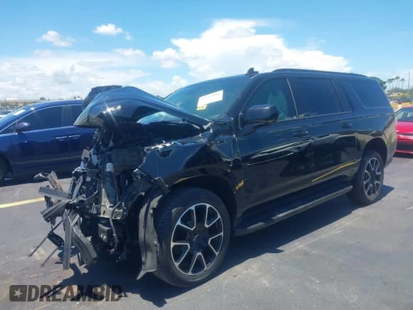 ✅ 2023 Chevrolet Suburban • VIN: 1GNSCEKT8PR130495 • Lot: 42572996. Listed on IAAI with 115,347 mi. Free auction sales archive from the USA and detailed vehicle history report at DreamBid. Image 2.