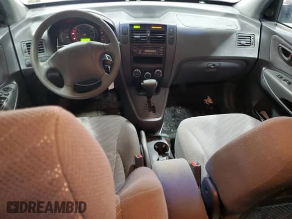 2005 Hyundai Tucson GL with VIN KM8JM12BX5U067598, listed as a Copart auction lot 81336444 with 102,027 mi miles and Clean title. Bid and sale history available at DreamBid. Image 8.