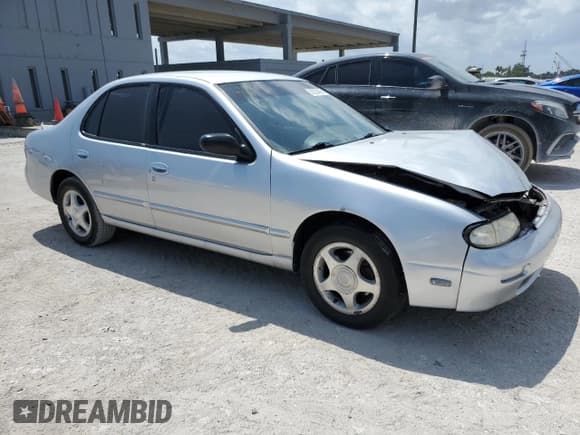 ✅ 1997 Nissan Altima XE • VIN: 1N4BU31D1VC200428 • Lot: 52252425. Listed on Copart with 173,553 mi. Free auction sales archive from the USA and detailed vehicle history report at DreamBid. Image 4.