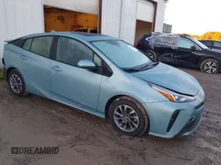 ✅ 2021 Toyota Prius L Eco • VIN: JTDKAMFU6M3135446 • Lot: 43524389. Wystawiony na IAAI z przebiegiem 90 519 mil. Bezpłatny archiwum sprzedaży aukcyjnych z USA i szczegółowy raport historii pojazdu na DreamBid. Zdjęcie 1.