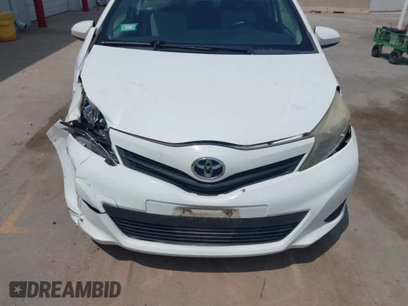 ✅ 2012 Toyota Yaris L • VIN: JTDJTUD33CD503218 • Lot: 42530667. Listed on IAAI with 12,591 mi. Free auction sales archive from the USA and detailed vehicle history report at DreamBid. Image 6.