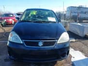 ✅ 2006 Suzuki Aerio • VIN: JS2RB62S065300349 • Lot: 41796030. Wystawiony na IAAI z przebiegiem 67 098 mil. Bezpłatny archiwum sprzedaży aukcyjnych z USA i szczegółowy raport historii pojazdu na DreamBid. Zdjęcie 12.