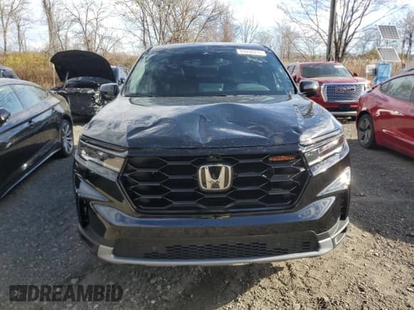 ✅ 2025 Honda Pilot TrailSport • VIN: 5FNYG1H66SB012798 • Lot: 93936915. Wystawiony na Copart z przebiegiem 14 010 mil. Bezpłatny archiwum sprzedaży aukcyjnych z USA i szczegółowy raport historii pojazdu na DreamBid. Zdjęcie 5.