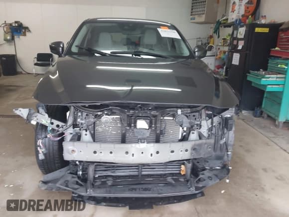 ✅ 2022 Mazda CX-5 S Carbon Edition • VIN: JM3KFBCM1N0577670 • Лот: 43821338. Опубликован ранее на IAAI с пробегом 59 967 миль. Бесплатный доступ к архиву аукционных продаж из США и подробный отчёт об истории автомобиля на DreamBid. Изображение 12.