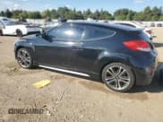 ✅ 2016 Hyundai Veloster Turbo R-Spec • VIN: KMHTC6AE5GU257011 • Lot: 69742065. Wystawiony na Copart z przebiegiem 104 711 mil. Bezpłatny archiwum sprzedaży aukcyjnych z USA i szczegółowy raport historii pojazdu na DreamBid. Zdjęcie 2.