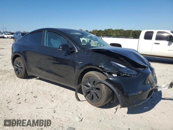 ✅ 2024 Tesla Model Y • VIN: 7SAYGDED5RA308071 • Lot: 82518185. Listed on Copart with 15,104 mi. Free auction sales archive from the USA and detailed vehicle history report at DreamBid. Image 4.