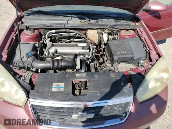 2006 Chevrolet Malibu 0LT z VIN 1G1ZT51F26F203064, wystawiony jako Copart lot #77491144 z przebiegiem 319 341 mil mil oraz Szkoda całkowita • Salvage title. Historia ofert i sprzedaży dostępna na DreamBid. Obrazek 12.