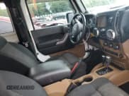 ✅ 2012 Jeep Wrangler Sahara • VIN: 1C4AJWBG5CL134097 • Lot: 58729075. Wystawiony na Copart z przebiegiem 191 504 mil. Bezpłatny archiwum sprzedaży aukcyjnych z USA i szczegółowy raport historii pojazdu na DreamBid. Zdjęcie 8.