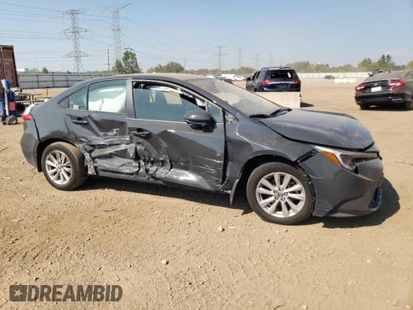 ✅ 2023 Toyota Corolla Hybrid LE • VIN: JTDBCMFE9P3011176 • Лот: 80942695. Опубликован ранее на Copart с пробегом 24 472 миль. Бесплатный доступ к архиву аукционных продаж из США и подробный отчёт об истории автомобиля на DreamBid. Изображение 4.