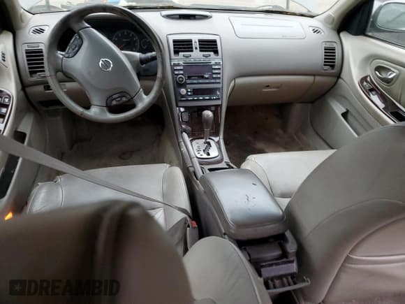 ✅ 2003 Nissan Maxima GLE • VIN: JN1DA31A23T438399 • Лот: 92878585. Опубликован ранее на Copart с пробегом Не указан. Бесплатный доступ к архиву аукционных продаж из США и подробный отчёт об истории автомобиля на DreamBid. Изображение 8.