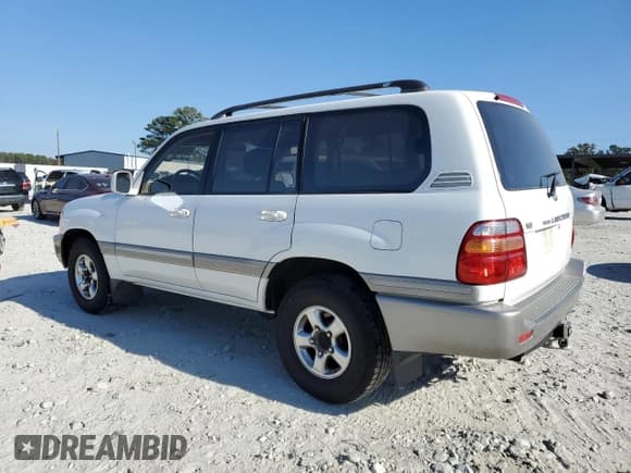 ✅ 2001 Toyota Land Cruiser • VIN: JTEHT05J712009629 • Lot: 77109164. Listed on Copart with 237,416 mi. Free auction sales archive from the USA and detailed vehicle history report at DreamBid. Image 2.