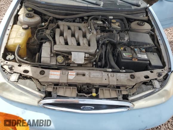 ✅ 1998 Ford Contour LX • VIN: 1FAFP66LXWK197384 • Lot: 51519385. Listed on Copart with 56,958 mi. Free auction sales archive from the USA and detailed vehicle history report at DreamBid. Image 11.