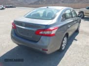 ✅ 2015 Nissan Sentra S • VIN: 3N1AB7AP2FY308498 • Lot: 43256921. Listed on IAAI with 83,637 mi. Free auction sales archive from the USA and detailed vehicle history report at DreamBid. Image 4.