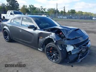 ✅ 2022 Dodge Charger Scat Pack • VIN: 2C3CDXGJ0NH134779 • Лот: 43255539. Опубликован ранее на IAAI с пробегом 33 795 миль. Бесплатный доступ к архиву аукционных продаж из США и подробный отчёт об истории автомобиля на DreamBid. Изображение 1.