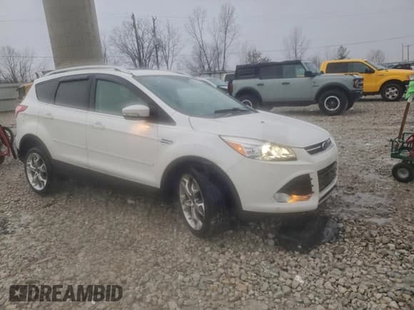 ✅ 2015 Ford Escape Titanium • VIN: 1FMCU0JX3FUA50546 • Lot: 94234395. Listed on Copart with 101,523 mi. Free auction sales archive from the USA and detailed vehicle history report at DreamBid. Image 4.
