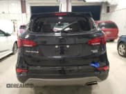 ✅ 2018 Hyundai Santa Fe 2.4L • VIN: 5NMZTDLB7JH101170 • Лот: 74567873. Опубликован ранее на Copart с пробегом 70 918 миль. Бесплатный доступ к архиву аукционных продаж из США и подробный отчёт об истории автомобиля на DreamBid. Изображение 6.