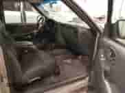 2004 Chevrolet Blazer LS with VIN 1GNCT18X64K126098, listed as a IAAI auction lot 41744502 with 26 mi miles and . Bid and sale history available at DreamBid. Image 5.