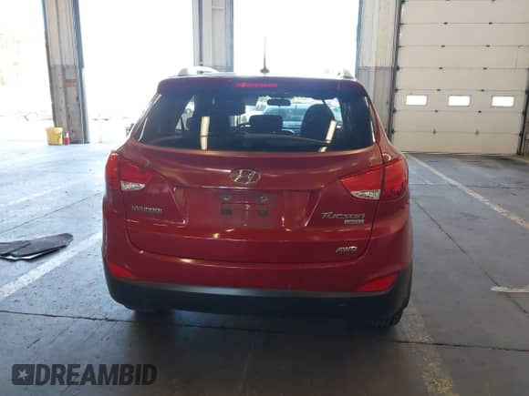 2010 Hyundai Tucson GLS with VIN KM8JUCAC5AU103469, listed as a IAAI auction lot 43394997 with 123,949 mi miles and . Bid and sale history available at DreamBid. Image 16.
