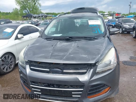 ✅ 2013 Ford Escape Titanium • VIN: 1FMCU9J99DUD68058 • Lot: 42124825. Listed on IAAI with 108,537 mi. Free auction sales archive from the USA and detailed vehicle history report at DreamBid. Image 6.