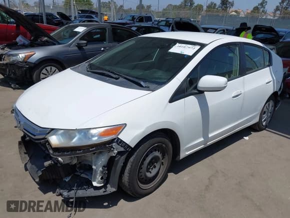 ✅ 2014 Honda Insight LX • VIN: JHMZE2H51ES001317 • Лот: 42587972. Опубликован ранее на IAAI с пробегом 191 780 миль. Бесплатный доступ к архиву аукционных продаж из США и подробный отчёт об истории автомобиля на DreamBid. Изображение 2.