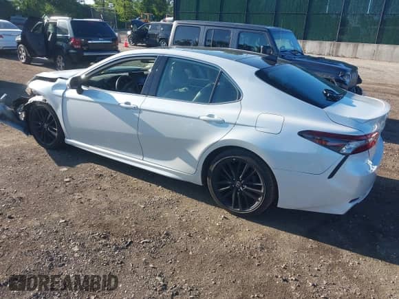 2022 Toyota Camry XSE with VIN 4T1K61BK5NU056488, listed as a IAAI auction lot 42529138 with 27,923 mi miles and . Bid and sale history available at DreamBid. Image 3.