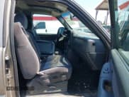 ✅ 2001 GMC Sierra 1500 SLE • VIN: 1GTEK19T31E271805 • Лот: 42167399. Опубликован ранее на IAAI с пробегом 206 202 миль. Бесплатный доступ к архиву аукционных продаж из США и подробный отчёт об истории автомобиля на DreamBid. Изображение 5.