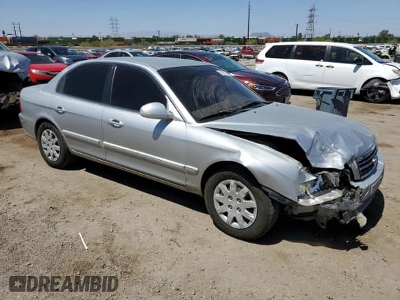✅ 2006 Kia Optima LX • VIN: KNAGD126665468978 • Lot: 59178705. Listed on Copart with 145,046 mi. Free auction sales archive from the USA and detailed vehicle history report at DreamBid. Image 4.