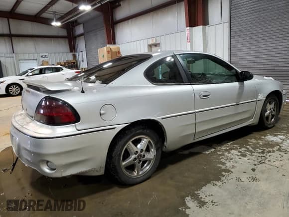 ✅ 2003 Pontiac Grand Am GT1 • VIN: 1G2NV12E13C210958 • Лот: 44367365. Опубликован ранее на Copart с пробегом 174 976 миль. Бесплатный доступ к архиву аукционных продаж из США и подробный отчёт об истории автомобиля на DreamBid. Изображение 3.