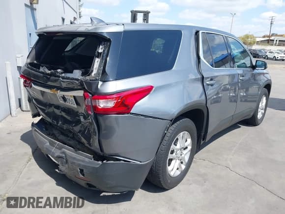 ✅ 2020 Chevrolet Traverse LS • VIN: 1GNERFKW4LJ279328 • Lot: 43182524. Listed on IAAI with 75,612 mi. Free auction sales archive from the USA and detailed vehicle history report at DreamBid. Image 4.