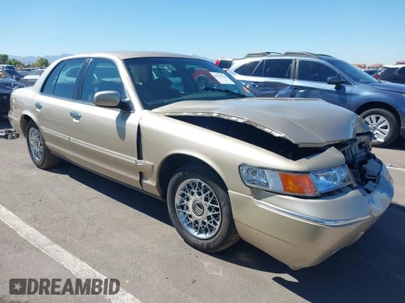 ✅ 1999 Mercury Grand Marquis GS • VIN: 2MEFM74W4XX707957 • Лот: 43355350. Опубликован ранее на IAAI с пробегом 71 095 миль. Бесплатный доступ к архиву аукционных продаж из США и подробный отчёт об истории автомобиля на DreamBid. Изображение 1.