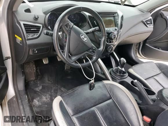 2013 Hyundai Veloster Turbo с VIN KMHTC6AE0DU153926, выставлен на аукционе Copart как лот 66184095 с пробегом 78 193 миль миль и Списание • Salvage title. История ставок и продаж доступна на DreamBid. Изображение 8.