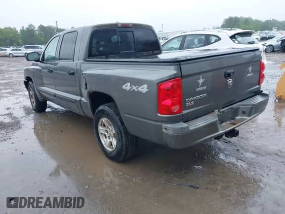 2007 Dodge Dakota SLT with VIN 1D7HW48K17S129383, listed as a IAAI auction lot 42253930 with 164,430 mi miles and . Bid and sale history available at DreamBid. Image 3.