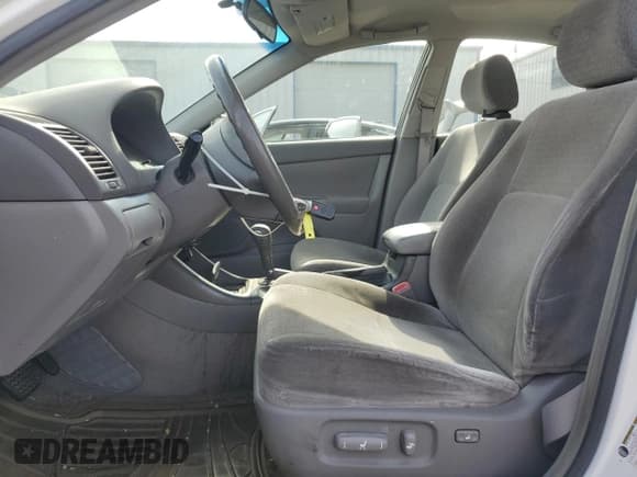 ✅ 2004 Toyota Camry LE • VIN: JTDBE32K540272608 • Lot: 90066615. Wystawiony na Copart z przebiegiem 337 761 mil. Bezpłatny archiwum sprzedaży aukcyjnych z USA i szczegółowy raport historii pojazdu na DreamBid. Zdjęcie 7.