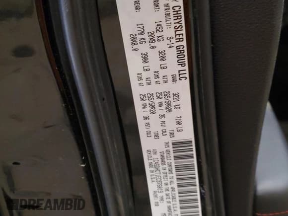 ✅ 2014 Dodge Durango R/T • VIN: 1C4SDHCT1EC976019 • Lot: 42511575. Listed on Copart with 115,093 mi. Free auction sales archive from the USA and detailed vehicle history report at DreamBid. Image 13.