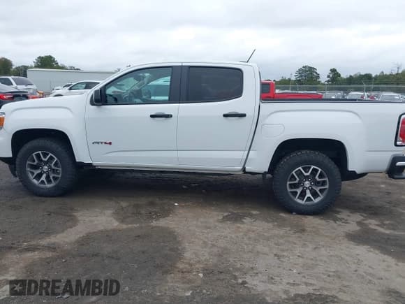✅ 2022 GMC Canyon 4WD AT4 • VIN: 1GTG6FEN6N1263017 • Лот: 43403313. Опубликован ранее на IAAI с пробегом 39 750 миль. Бесплатный доступ к архиву аукционных продаж из США и подробный отчёт об истории автомобиля на DreamBid. Изображение 14.