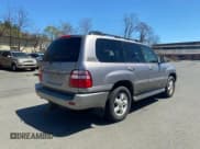 ✅ 2004 Toyota Land Cruiser • VIN: JTEHT05J542063838 • Lot: 55477635. Listed on Copart with 290,726 mi. Free auction sales archive from the USA and detailed vehicle history report at DreamBid. Image 4.