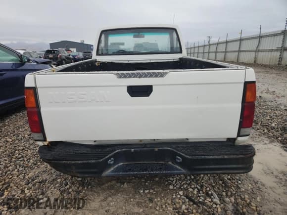 ✅ 1989 Nissan Hardbody • VIN: 1N6ND11S6KC399804 • Lot: 84070345. Wystawiony na Copart z przebiegiem 241 780 mil. Bezpłatny archiwum sprzedaży aukcyjnych z USA i szczegółowy raport historii pojazdu na DreamBid. Zdjęcie 6.