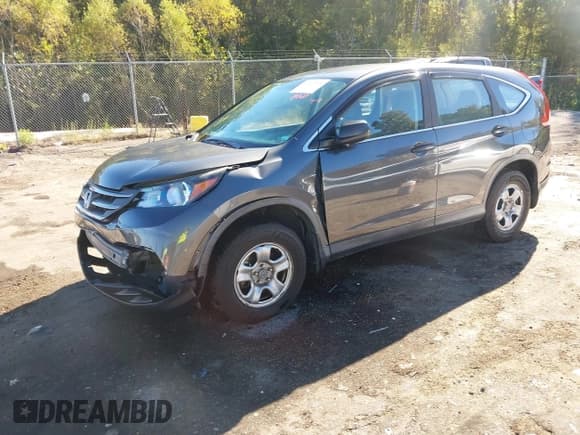 ✅ 2013 Honda CR-V LX • VIN: 3CZRM3H39DG710070 • Lot: 43602535. Listed on IAAI with 105,591 mi. Free auction sales archive from the USA and detailed vehicle history report at DreamBid. Image 2.