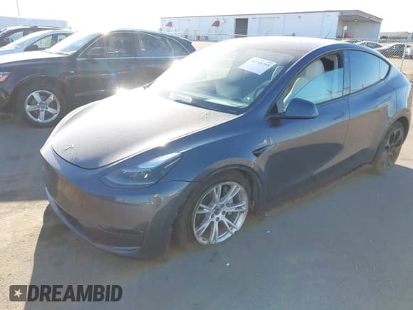 ✅ 2023 Tesla Model Y Long Range • VIN: 7SAYGAEEXPF714760 • Lot: 41748398. Listed on IAAI with 49,802 mi. Free auction sales archive from the USA and detailed vehicle history report at DreamBid. Image 18.
