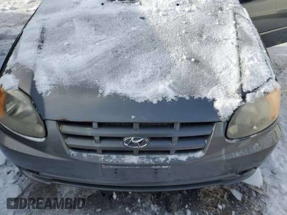 2005 Hyundai Accent GLS z VIN KMHCG35CX5U323836, wystawiony jako Copart lot #45794965 z przebiegiem Nie podano mil oraz Czysty tytuł • Clean title. Historia ofert i sprzedaży dostępna na DreamBid. Obrazek 11.