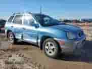 2004 Hyundai Santa Fe with VIN KM8SB12B64U826594, listed as a Copart auction lot 90612545 with 101,208 mi miles and Salvage title. Bid and sale history available at DreamBid. Image 4.