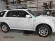 2009 Mercury Mariner Premier with VIN 4M2CU97729KJ00086, listed as a IAAI auction lot 41418490 with 167,486 mi miles and . Bid and sale history available at DreamBid. Image 13.