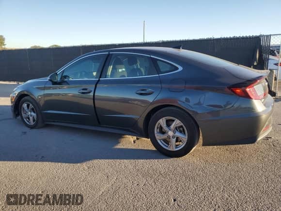 2023 Hyundai Sonata SE z VIN KMHL24JA0PA262896, wystawiony jako Copart lot #91007895 z przebiegiem 124 354 mil mil oraz Czysty tytuł • Clean title. Historia ofert i sprzedaży dostępna na DreamBid. Obrazek 2.