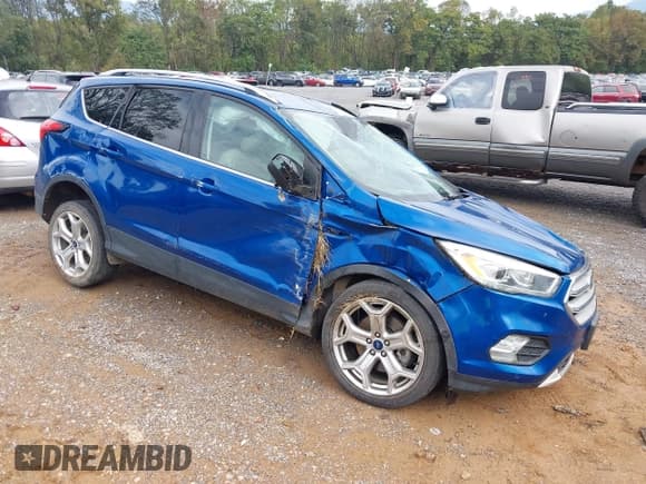 ✅ 2019 Ford Escape Titanium • VIN: 1FMCU9J92KUB75666 • Lot: 43328031. Listed on IAAI with 75,870 mi. Free auction sales archive from the USA and detailed vehicle history report at DreamBid. Image 1.