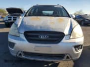 ✅ 2009 Kia Rondo LX • VIN: KNAFG528597247666 • Lot: 91951305. Wystawiony na Copart z przebiegiem 103 966 mil. Bezpłatny archiwum sprzedaży aukcyjnych z USA i szczegółowy raport historii pojazdu na DreamBid. Zdjęcie 5.