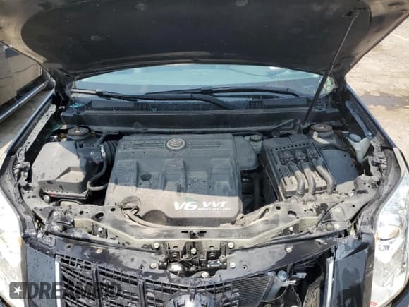 ✅ 2015 Cadillac SRX Premium Collection • VIN: 3GYFNGE3XFS573121 • Lot: 64599105. Wystawiony na Copart z przebiegiem 105 369 mil. Bezpłatny archiwum sprzedaży aukcyjnych z USA i szczegółowy raport historii pojazdu na DreamBid. Zdjęcie 12.