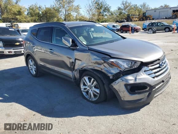 ✅ 2013 Hyundai Santa Fe Sport • VIN: 5XYZU3LA7DG105393 • Lot: 87478205. Listed on Copart with 63,677 mi. Free auction sales archive from the USA and detailed vehicle history report at DreamBid. Image 4.