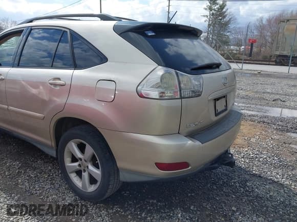 ✅ 2007 Lexus RX 350 • VIN: 2T2GK31UX7C010705 • Lot: 41731795. Listed on IAAI with 242,456 mi. Free auction sales archive from the USA and detailed vehicle history report at DreamBid. Image 3.