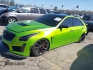 ✅ 2016 Cadillac CTS-V • VIN: 1G6A15S69G0118125 • Lot: 38931522. Listed on IAAI with 37,307 mi. Free auction sales archive from the USA and detailed vehicle history report at DreamBid. Image 2.